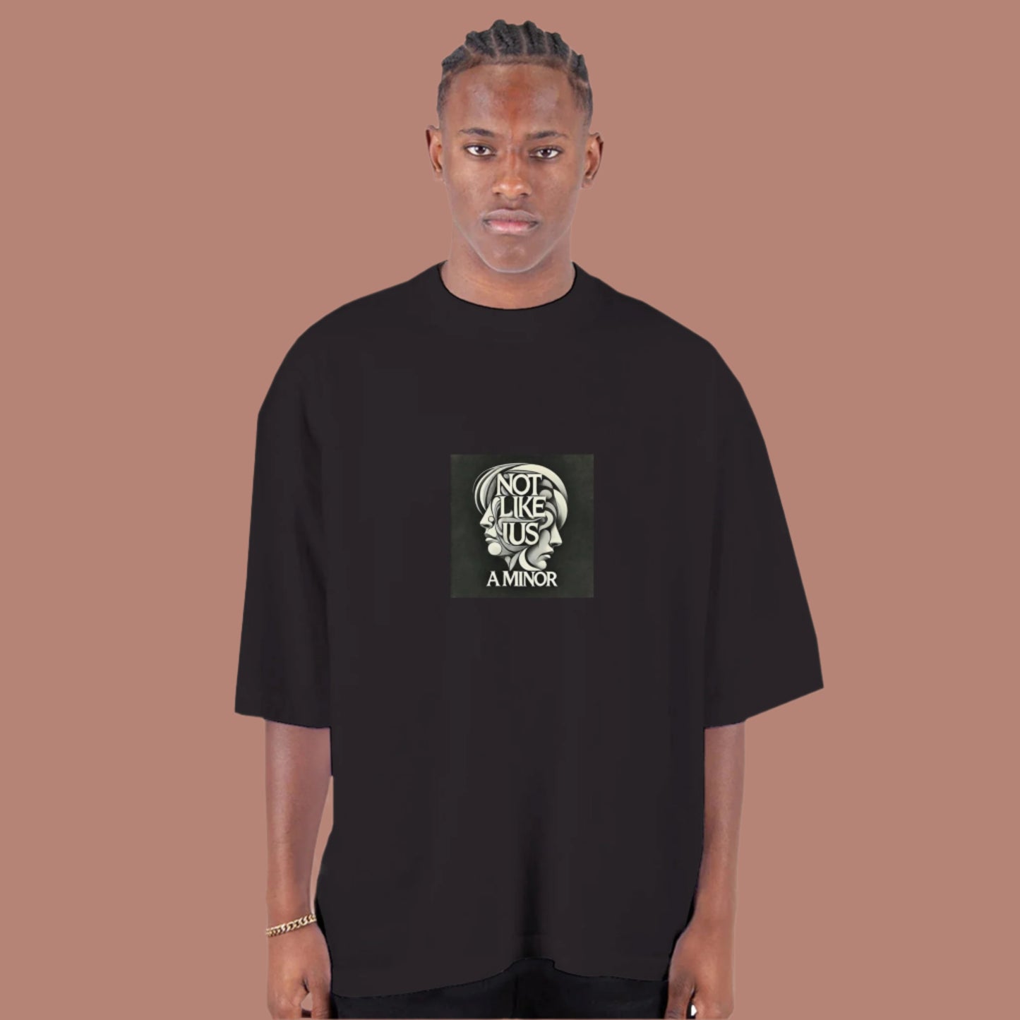 Black oversized T-shirt with not like us a minor black printed on the chest beige background