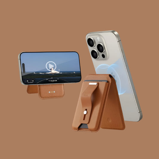 Brown Magnetic Card holder holding a silver phone up in portrait position