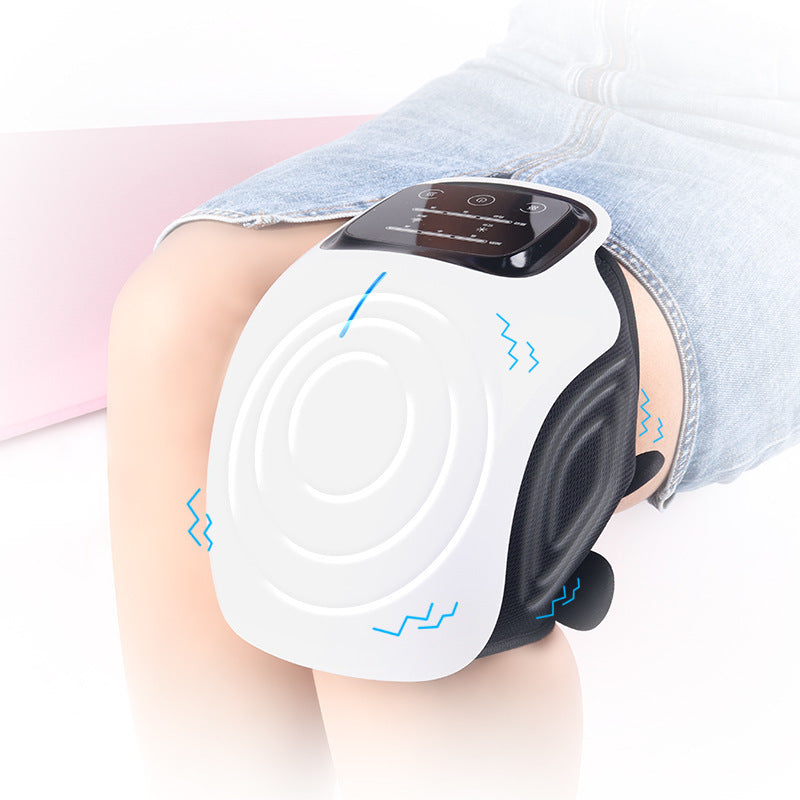 Vibration Knee Massager on the knee of a woman