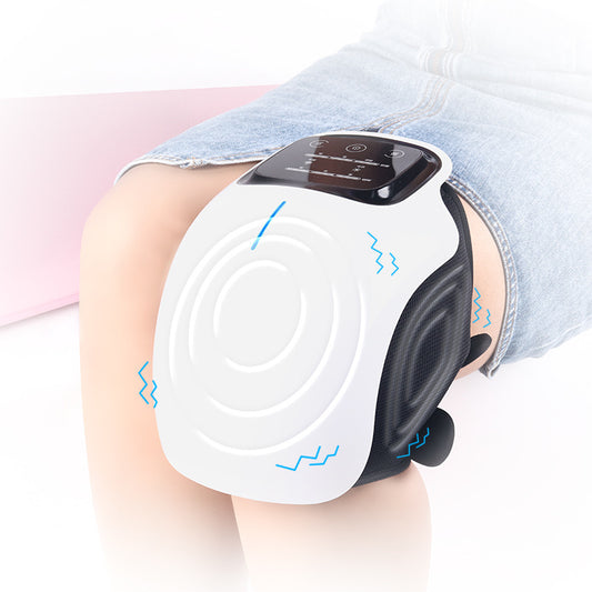 Vibration Knee Massager on the knee of a woman